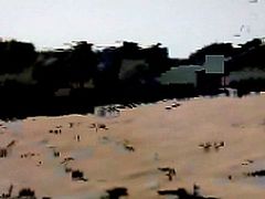 TWO SMOKING HOT TEEN NUDISTS PLAYING FRISBY AT THE NUDE BEACH