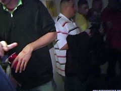 Party girls are chilling at the college party having heavy drinks. Then one of the hoes exposes her tits letting horny guy suckle her boobs. Then she kneels down giving a head.