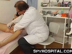 Cum inside and check out this hidden camera footage as a hot brunette teen with big tits goes to the gynecologist and is forced to get buck naked and gets her pussy fingered by pervert doc.