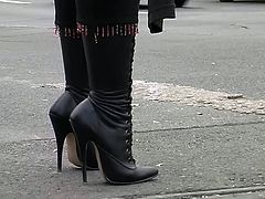 woman in very high boots