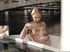 Adorable blonde Ivana Sugar is getting naughty in the bathroom. She fondles her wet body and then rubs her clit and sweet pussy-lips.