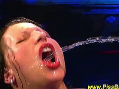 This German slut is soaked in piss and men are still peeing on her. They don't stop peeing on her just because a guy or two is fucking her cunt or her sloppy mouth.