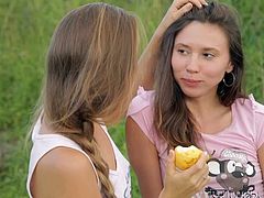 These two cute brunette lesbians head out to the field, to have a nice picnic and look at the clouds. Instead of eating sandwiches, they end up kissing and eating pussy. Watch these two girls get nasty outdoors.