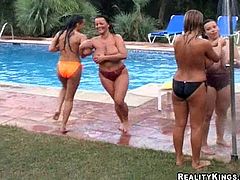 A bunch of bitches with big-as tits fuckin' and suckin' dick by the pool, check it out right here! It's pretty good stuff.