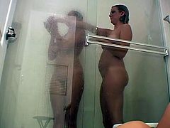 These stunning beauties love taking showers together and we get to enjoy two pussies and two pair of sexy, natural tits in one place.