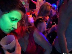 Trashy party lesbians touching their hot bodies with lust and licking their slick pussies in a club
