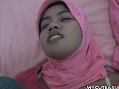 This sweet Asian teen enjoys having a hard boner in her mouth. That’s why she is on her knees in front of her lover and slobbering all over his thick cock. He rewards her by rubbing her sweet hairy pussy and teasing her tender tight asshole.