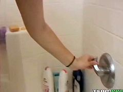 That young wench looks beautiful! Babe's all naked sensually rubs her curves while taking shower. Watch how water drips down her natural tits and her bald puffy cunt.
