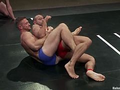 Four guys are divided into two teams. They fight fiercely in the ring in front of the audience. After the fight guys from the losing team get ass fucked.