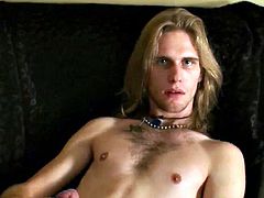 Long haired gay dude takes off his clothes and plays with his cock. He is rock hard and it doesn't take much stroking before he cums.