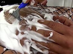 Just look how horny and sexy this slut is! Horny stud shaves her juicy twat the way she likes it. Then he fucks her muff with her favorite dildo.