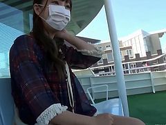 SexJapanTV brings you an amazing free porn video where yo can see how a cute and busty Japanese brunette masturbates in public while assuming very hot poses.