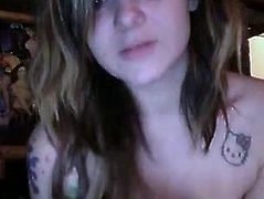 Frisky girl with pretty face and perky tits is sitting topless in front of webcam. She then kneads her tits sensually. Alluring amateur babe in exciting solo homemade video.