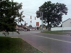 1992 gillig bus going through city in evansville,indiana