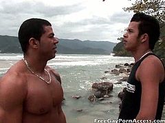 Junior Pavanello was sitting on the beach, admiring the view when Christian Torquato showed up topless. He was so attracted to him, that he immediately offered him a blowjob.