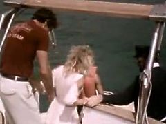 Seductive blonde vintage babe kisses her boyfriend and starts to blow his cock. She gives him eager outdoor blowjob. This hot retro sex tube video is well worth seeing.