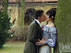 All the people in this video are dressed in XVIII century clothes. Some brunette lady falls in love with some gentleman. She gives him a blowjob in a garden and then gets ass fucked in a barn. The man also cums on her pretty face.