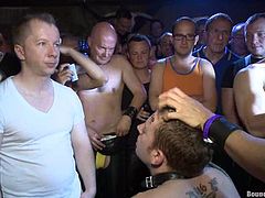 Van Darkholme, Spencer Reed and many other faggots are having a gay BDSM party. The tattooed fairy allows his buddies to bind and humiliate him and then gets his mouth and asshole smashed.