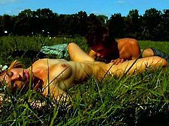 These teens took a walk to an open field where they gave each other some hot and steamy oral  sex and then they make love in the grass and kiss each other passionately