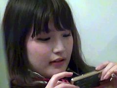 This sexy asian teenie is listening some music on her iPod and it makes her feel incredibly sexy. She spreads legs wide and uses her fingers to make herself cum.