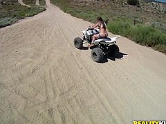 What are you waiting for? Watch this lady with enormous and natural breasts going crazy outdoors. Katy gets horny with quadricycles and you can't stop her!