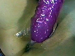 Homemade video with slutty woman fingering her vagina. Later on she licks a dildo and starts to toy her soaking pussy with several sex toys.