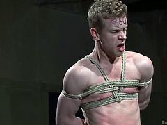 kinky executor plays with his gay sex slave