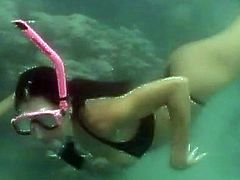 Diving undersea and showing boobs in the car is fun for this blonde sluts. As well as sucking cock in the backseat and being filmed.