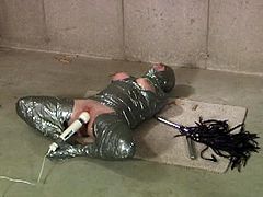 Wasteland brings you a hell of a free porn video where you can see how a hot and wild slave gets covered in duck tape and tortured by her master before he vibrates her cunt.