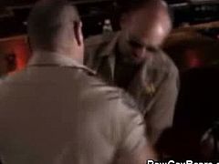 Check out these horny policeman having fun at the bar. After they make out a bit one gets immediately on his knees to suck his buddy's cock and swallow a load.