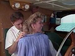 Blond head pretty looking bitch with nice Mamillas gives deep throat dick suck and energetically rides throbbing bonker on leather coach while yacht walk. Enjoy this sea fuck in The Classic Porn sex clip!