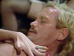Jane Bond and her friend are fighting over this stud's stiff cock. Slutty blondie takes the lead. She sits on this stud's face and lets him get a taste of her sweet pussy. Then she rides his swollen cock in cowgirl position.