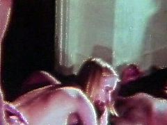 Slim blonde enjoys two cocks pounding her well during intense retro threesome scene