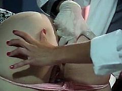 Watch this perverted doctor penetrating some of his plastic toys into his nurse's asshole in The Classic Porn sex clips.
