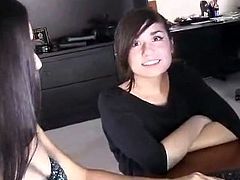 Two hot brunette babes watch some porn movie. Obviously they get very excited. Some girl squirts like a fountain in the video. Girls can't stop watching.