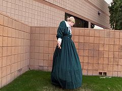 Old timey slut pulls up her big dress and plays with her fun old dildo! Weird costume but hot daytime public pussy action!