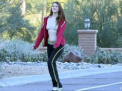 Shae puts on her exercise clothes and goes for a jog. As she runs down the road she unzips her jacket and flashes her tits.