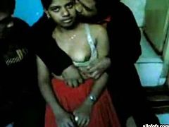 Gross and nasty Indian hooker is absolutely submissive to horny desi. He exposes her tits and squeezes them hard while making an amateur sex video.