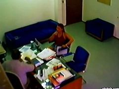 Skanky brunette chick strips in front of her boss. She kneels down taking hard dick in her mouth. She