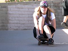 Get a hard dick watching this sexy blonde, with giant jugs wearing sportive clothes, while she plays with balls and skates outdoors.
