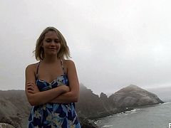 This horny blonde girl is going to have a weekend in a national park. She shows and fondles her hot boobs in the car. She also walks around the park and have good time there.
