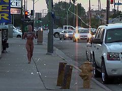 A blonde girl has an amazing sex outdoors. A guy fucks Nicole from behind in a standing position. Then she also strokes a dick and walks naked in the street.