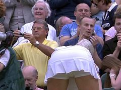 Sweaty tennis babe bending over after match