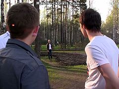 Young and slutty girl meets three guys at the park, gets turned on and guys take her home, undress and have a hardcore gangbang.