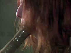 Leila is a horny teenage redheaed and she is about to get humiliated by her horny master. He uses his huge dildo and makes her deepthroat it like the slut she is.