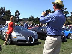 The very sexy Jessica showed off her long, amazing legs as she walked around a car show in high heels and a very hot, red dress.