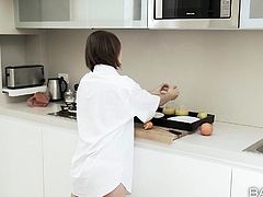 Tina's in the kitchen making breakfast for herself and her man. She goes to the bedroom instead and starts sucking his sausage. When she's had enough of his lolly in her mouth, she climbs on and slides down his shaft, taking every inch in her tight, wet hole.