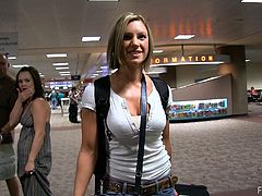 This naughty blonde model arrives to the airport after a vacation. She flashes her tits right there. Anne walks at the parking showing her amazing boobs.