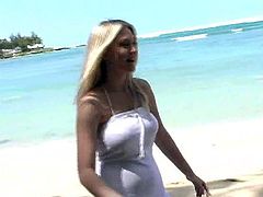 Captivating blonde Alison Angel is having a great time at a beach. She bathes and has fun and then takes her bikini off and demonstrates her hot body.