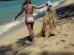 Captivating blonde Alison Angel is having a great time at a beach. She bathes and has fun and then takes her bikini off and demonstrates her hot body.